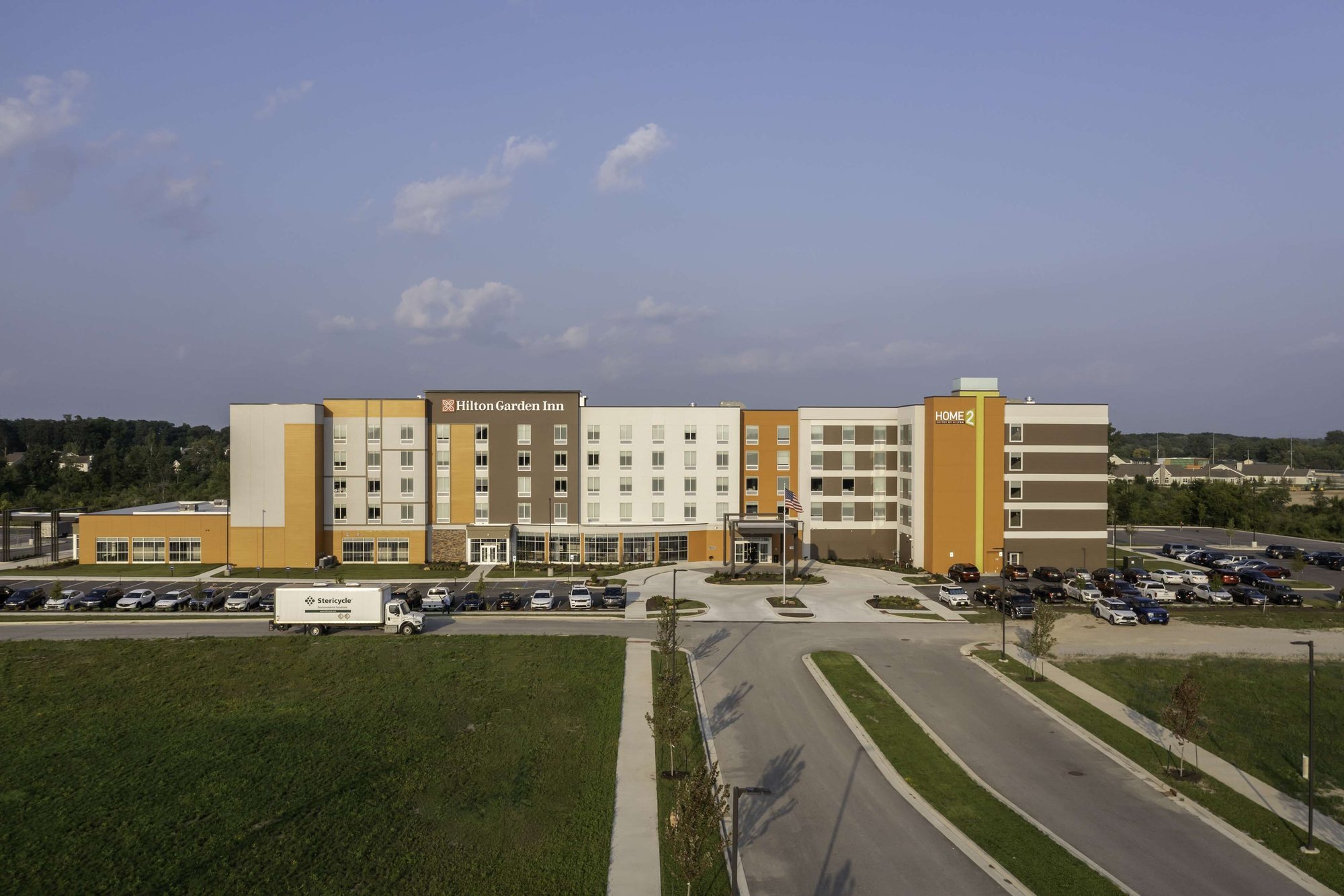 Dual-branded hotel campus seen from the entrance drive
