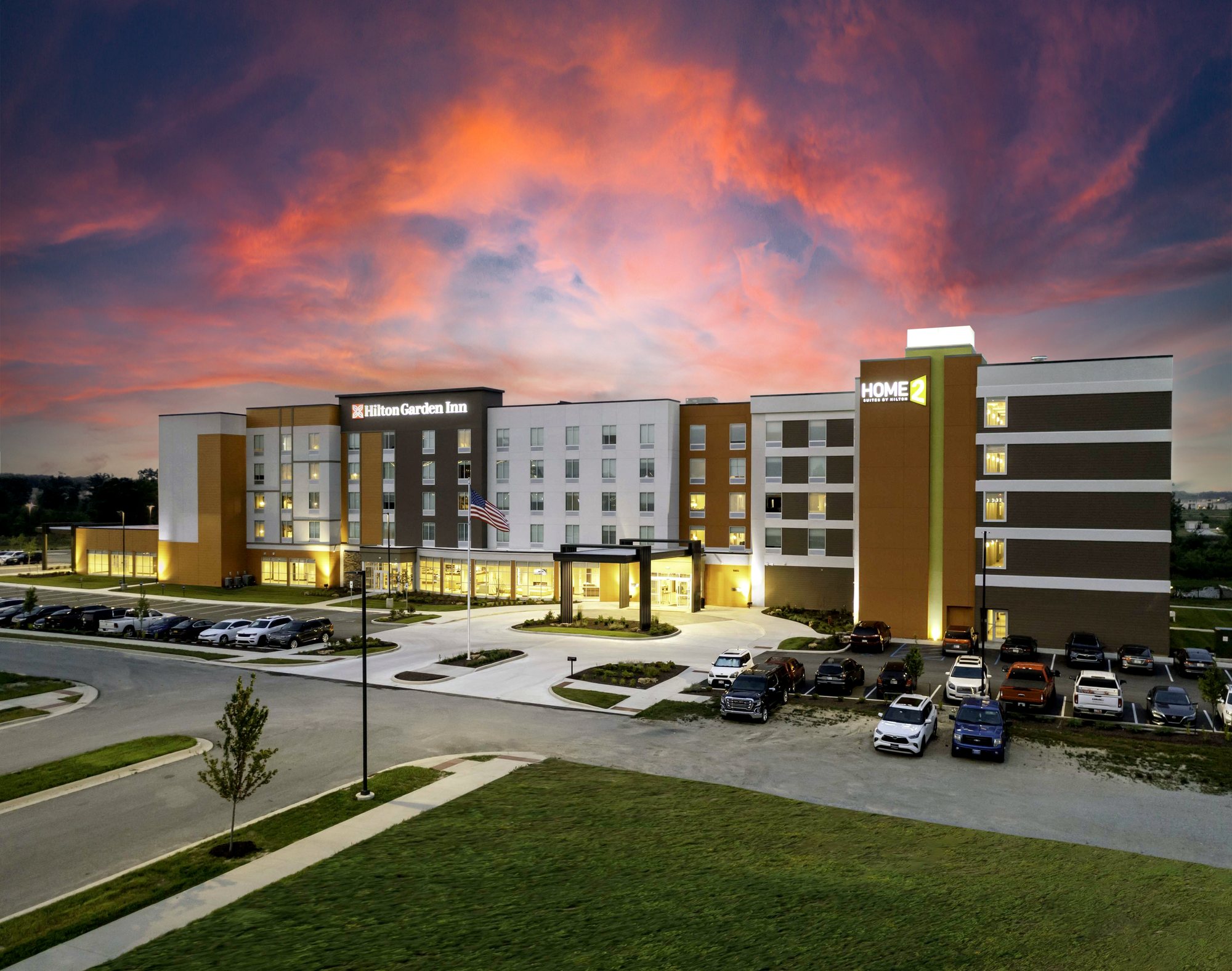 Dual-branded hotel exterior and entrance drive